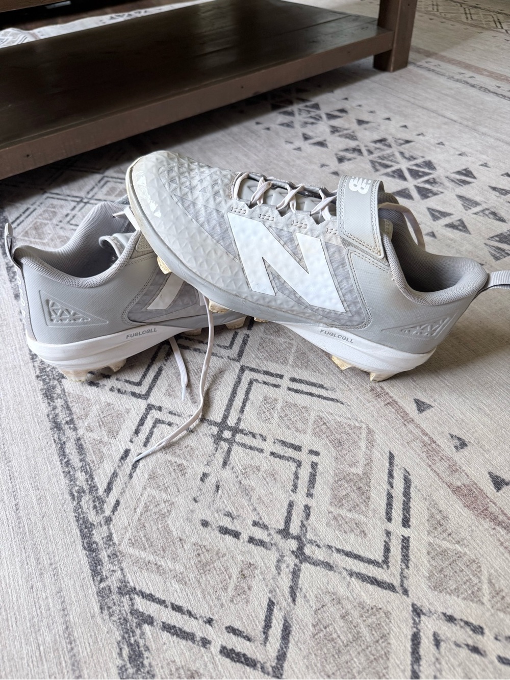 New Balance Light Gray Kids' Athletic Cleats with White Logo